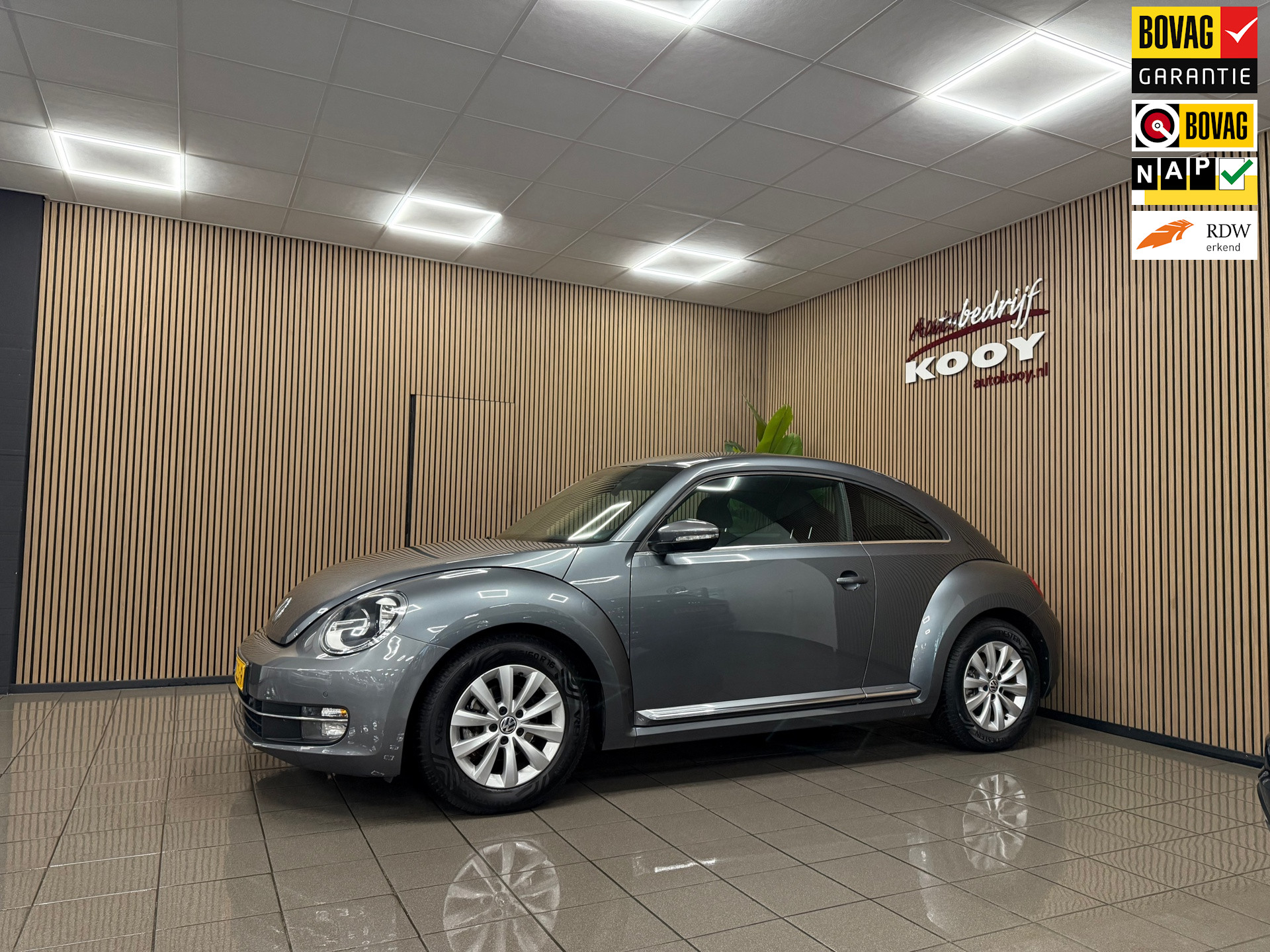 Volkswagen Beetle 1.2 TSI Design * Dealer onderhouden / Navigatie / Afn. Trekhaak / NL Auto *
